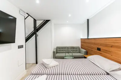 Cama o camas de una habitación en CC Atocha Apartments