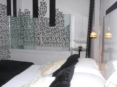 Cama o camas de una habitación en Hostal Santo Domingo