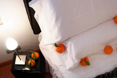 Cama o camas de una habitación en Hostal Santo Domingo