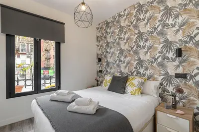 Cama o camas de una habitación en Waou Atocha II - Alquiler Corta Duración