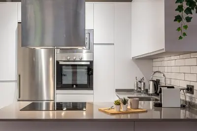 Una cocina o zona de cocina en Waou Atocha II - Alquiler Corta Duración