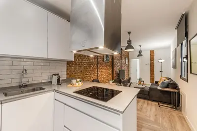 Una cocina o zona de cocina en Waou Atocha II - Alquiler Corta Duración