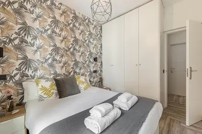 Cama o camas de una habitación en Waou Atocha II - Alquiler Corta Duración