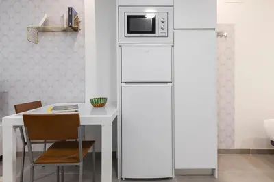 Una cocina o zona de cocina en Dobo Madrid América