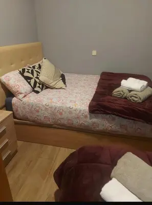 Cama o camas de una habitación en Infantas madrid al cielo 6