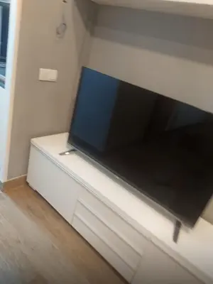 Una televisión o centro de entretenimiento en Infantas madrid al cielo 6