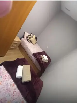Cama o camas de una habitación en Infantas madrid al cielo 6