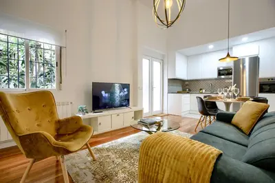 Una televisión o centro de entretenimiento en Casa de Campo Madrid - Apartamento de 2 dormitorios