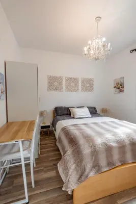 Cama o camas de una habitación en El Coqueto de Vallecas