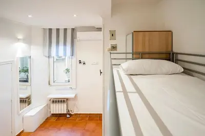 Cama o camas de una habitación en Agradable estudio 3 Personas / 2 camas en Gran Vía