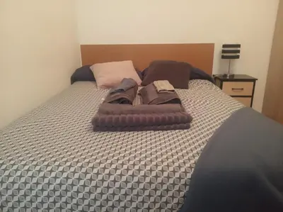 Cama o camas de una habitación en The clock