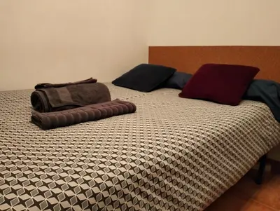 Cama o camas de una habitación en The clock