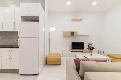 Una cocina o zona de cocina en Acogedor y Comodo apartamento Madrid A/C