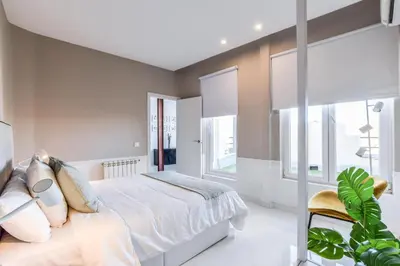 Cama o camas de una habitación en Apartamento Embajadores IX