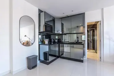 Una cocina o zona de cocina en Apartamento Embajadores IX