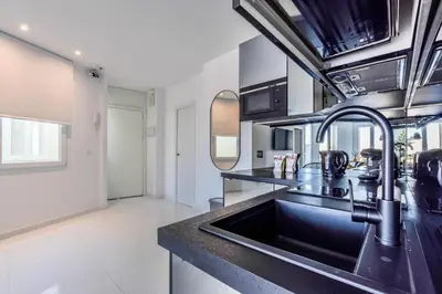 Una cocina o zona de cocina en Apartamento Embajadores IX