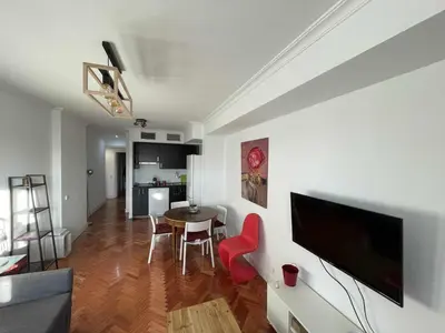Una televisión o centro de entretenimiento en Piso con vistas al Parque del Retiro