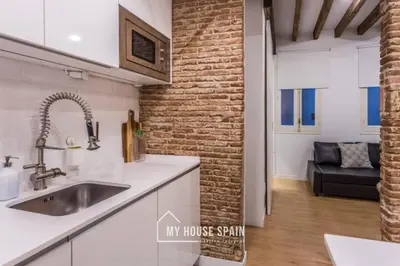 Una cocina o zona de cocina en MyHouseSpain - Piso en la Latina