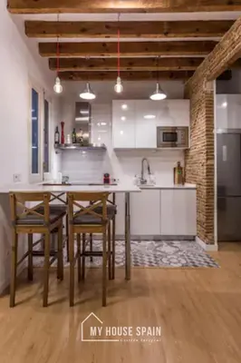 Una cocina o zona de cocina en MyHouseSpain - Piso en la Latina