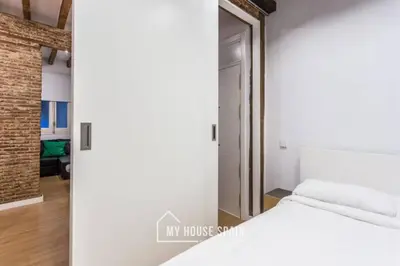 Cama o camas de una habitación en MyHouseSpain - Piso en la Latina
