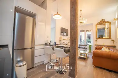 Una cocina o zona de cocina en MyHouseSpain - Vacacional piso de lujo en Lavapiés