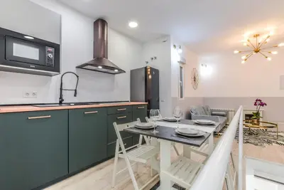 Una cocina o zona de cocina en MyHouseSpain - Fantastico piso nuevo cerca del centro