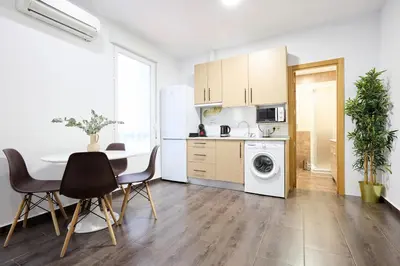 Una cocina o zona de cocina en Apartamentos Fuencarral II