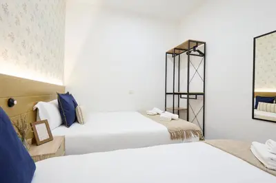 Cama o camas de una habitación en Apartamentos Fuencarral II