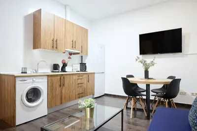 Una cocina o zona de cocina en Apartamentos Fuencarral II