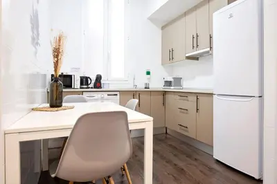 Una cocina o zona de cocina en Apartamentos Fuencarral II