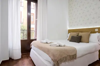 Cama o camas de una habitación en Apartamentos Fuencarral II