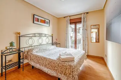 Cama o camas de una habitación en Bien situado y cómodo