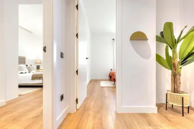 Cama o camas de una habitación en Luces en Madrid