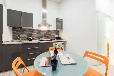 Una cocina o zona de cocina en Calle Huertas Galería by RegalateMadrid