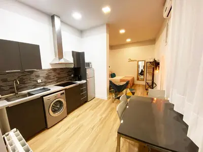 Una cocina o zona de cocina en Calle Huertas Acogedor by RegalateMadrid