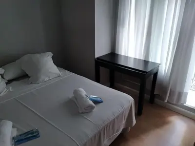 Cama o camas de una habitación en Apartamento HOTEL MONTAÑA LAVAPIES
