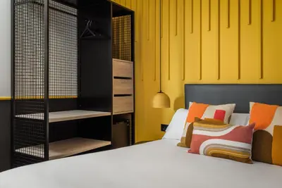 Cama o camas de una habitación en BYPILLOW Crosstown