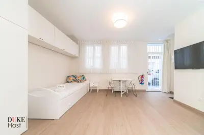 Una televisión o centro de entretenimiento en Marqués de Vadillo1 Apartments