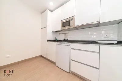 Una cocina o zona de cocina en Marqués de Vadillo1 Apartments