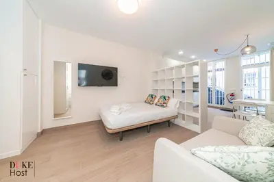 Una televisión o centro de entretenimiento en Marqués de Vadillo2 Apartments