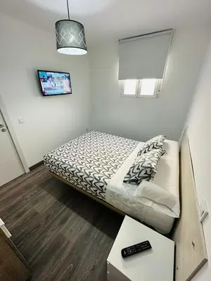 Cama o camas de una habitación en HOSPEDAJE NUEVA NUMANCIA