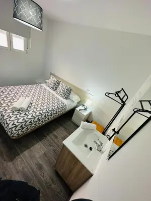 Cama o camas de una habitación en HOSPEDAJE NUEVA NUMANCIA