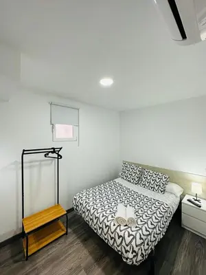 Cama o camas de una habitación en HOSPEDAJE NUEVA NUMANCIA