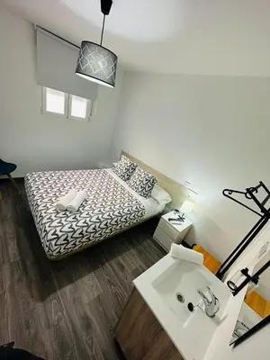 Cama o camas de una habitación en HOSPEDAJE NUEVA NUMANCIA