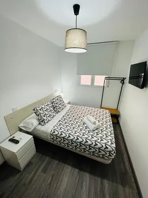 Cama o camas de una habitación en HOSPEDAJE NUEVA NUMANCIA