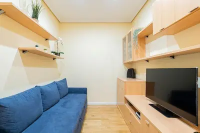 Una televisión o centro de entretenimiento en Tranquilo apartamento Pacífico/Ciudad de Barcelona