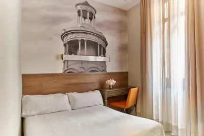 Cama o camas de una habitación en Regente Hotel