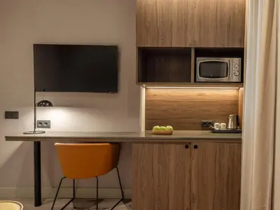 Una cocina o zona de cocina en Regente Hotel