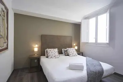 Cama o camas de una habitación en Apartamento VI Alcalá-Retiro. Ideal Parejas