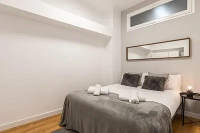 Cama o camas de una habitación en Waou Essence I Los Austrias - Corta Duración